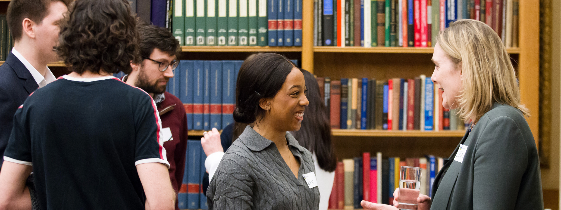 Two UCD alumnae networking at an event.